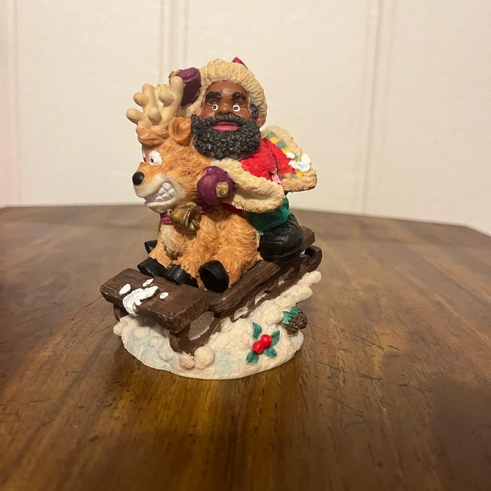 Santa And Reindeer Figurine